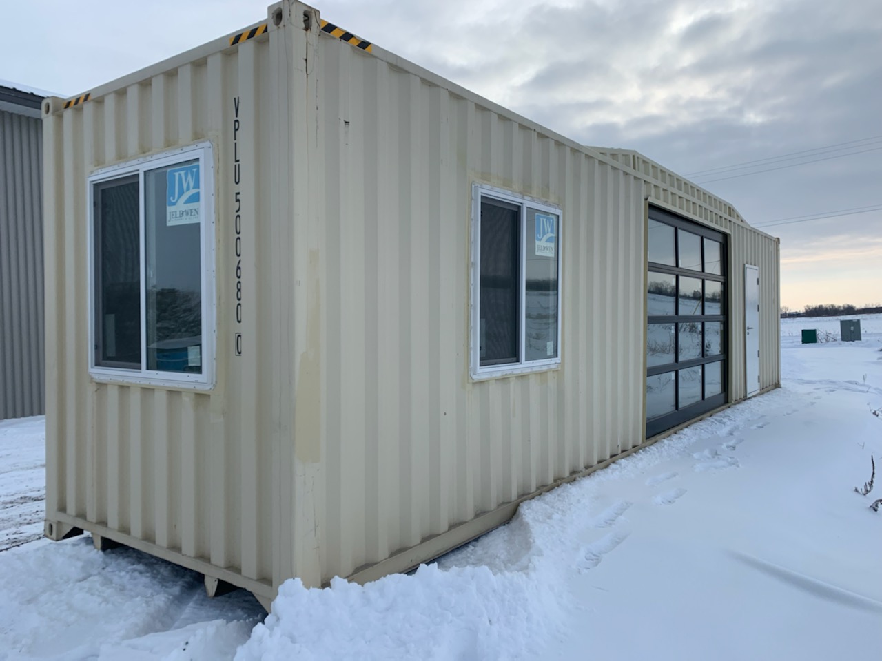 40′ High Cube  Refurbished Container with Fresh Paint, Man Door & Windows.